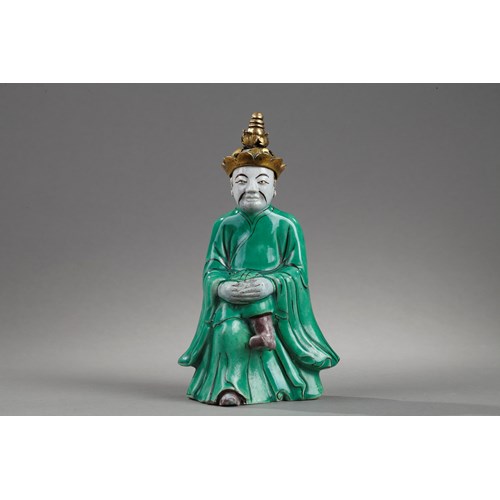 Figure seated in biscuit "Famille verte" with a golden bronze headdress the bronze probably occidental